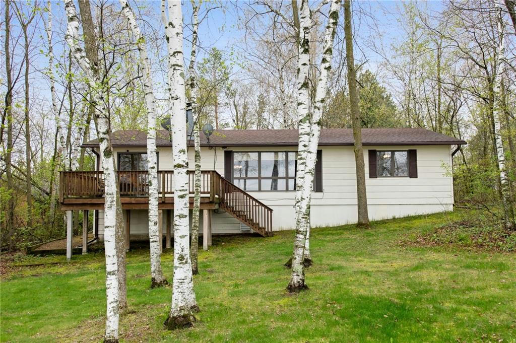 1215 3 3/4 4TH ST, TURTLE LAKE, WI 54889, photo 1 of 39